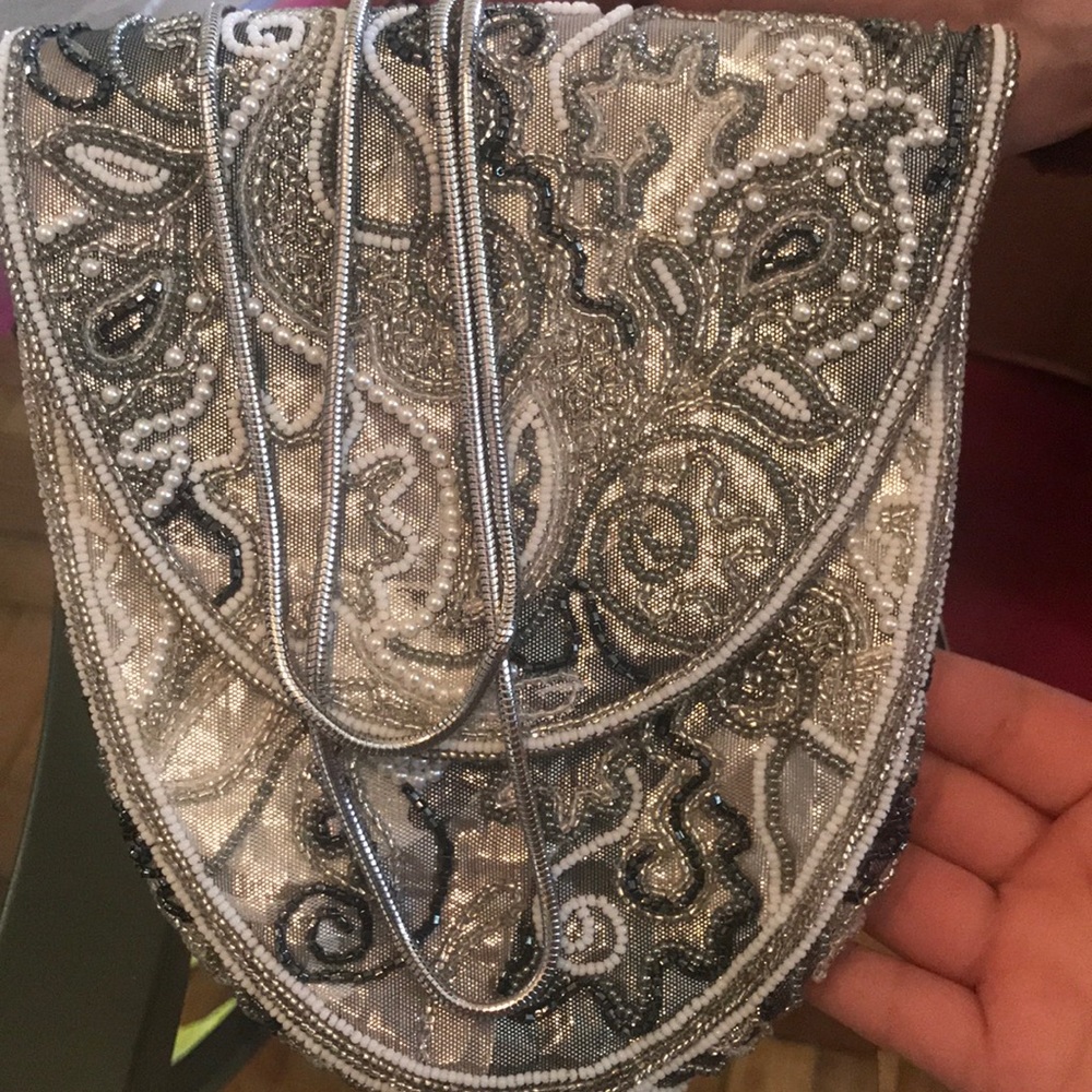A Hashimoto gray bag , silver chain